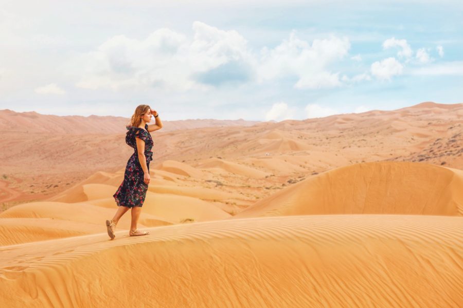 Woman looking further in the desert